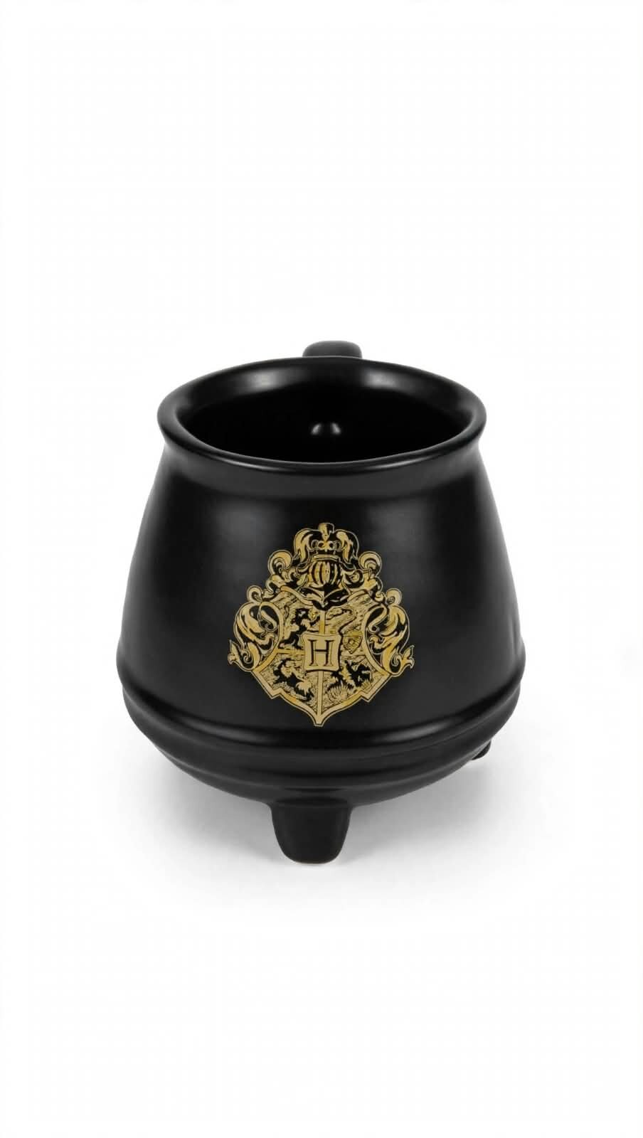 TAZA CALDERO 3D DE HARRY POTTER CERÁMICA NEGRA CON ESCUDO HOGWARTS EN RELIEVE DORADO 293 ML